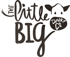 A black hand-lettered logo reading 'The Little Big Dairy Co' with a small cow face illustration above the text, shown on a white background.